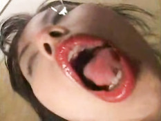 Asian girl licking window