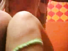 Horny blonde masturbating on the toilet