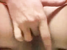 Horny blonde masturbating on the toilet