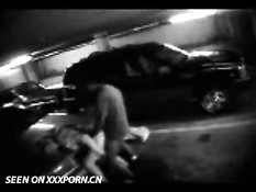 Couple caught on parkinglot cam