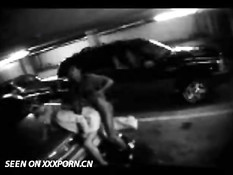 Couple caught on parkinglot cam