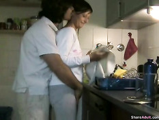 Young german couple in the kitchen