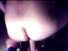 Riding a dildo