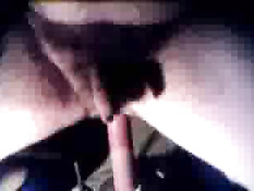 Riding a dildo