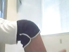 Young blonde strips on webcam