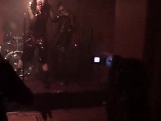 Gothic rocker boning a groupie