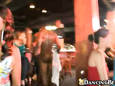 Giving the stripper a handjob